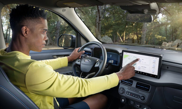 2025 Ford Maverick Interior Driver Using Infotainment System
