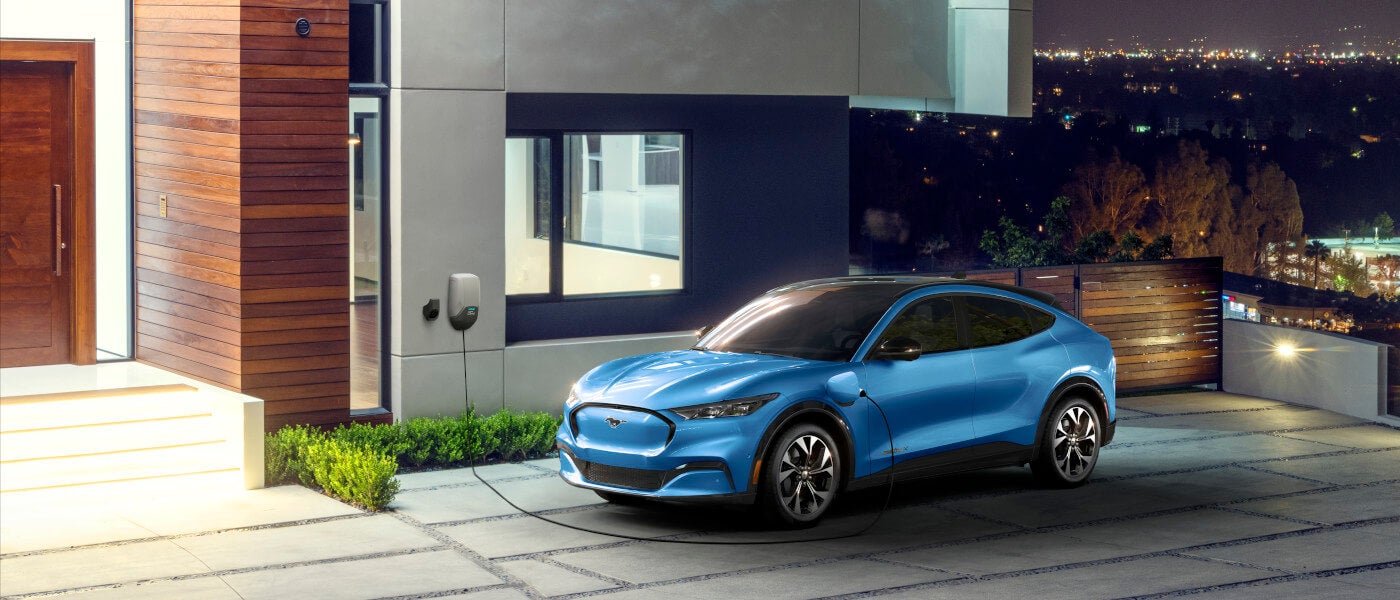 2025 Ford Mustang Mach-E Exterior Charging On A Driveway